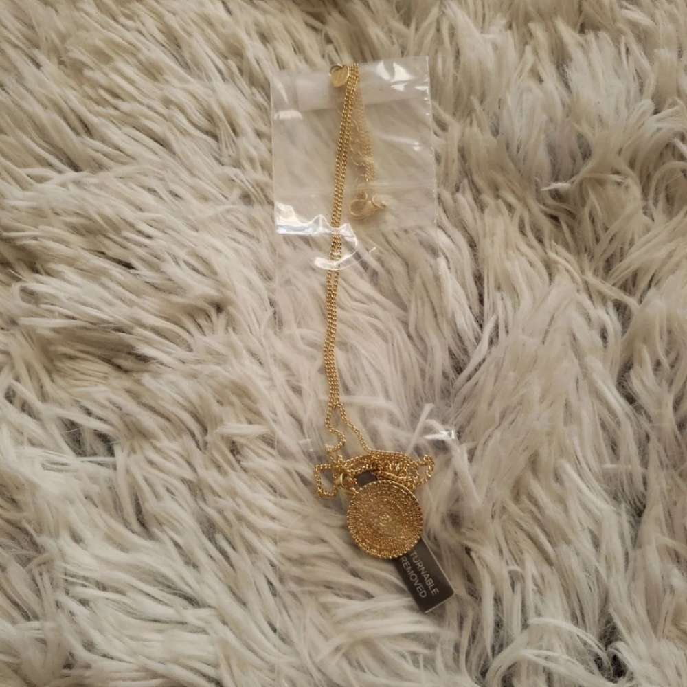 Gold medallion necklace